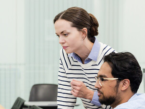 IT team looking at computer
