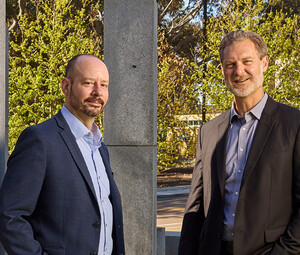 Daniel Suchy and Brett Pollak pose for a photo at the University of California, San Diego