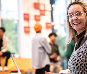 Person working on computer on campus