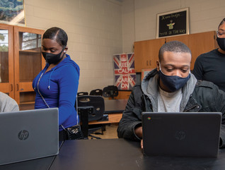 Title I students complete school work on HP laptops