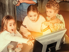 Students excited about innovation and collaboration on computer