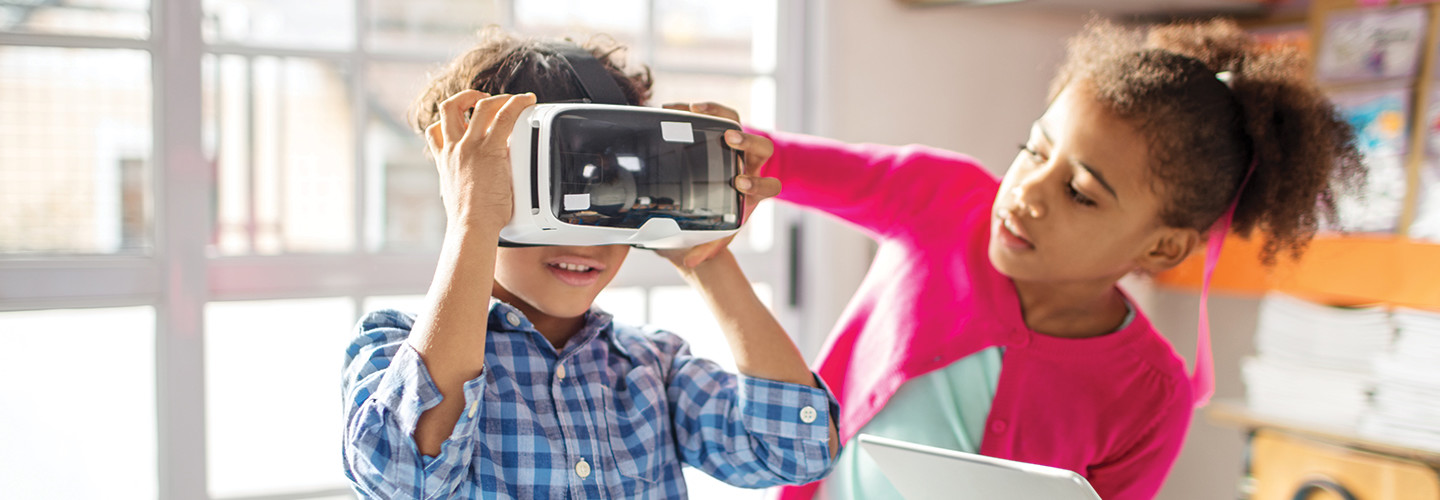 Kids use AR devices for education