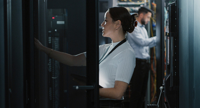People working in a data center