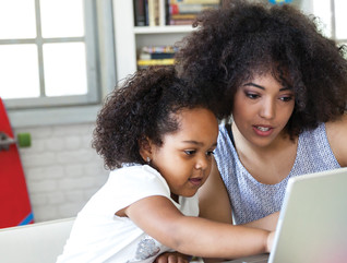 Student and Parent engaged in remote learning