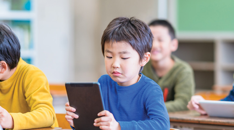 Student using technology in the classroom