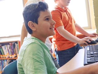Kid on computer