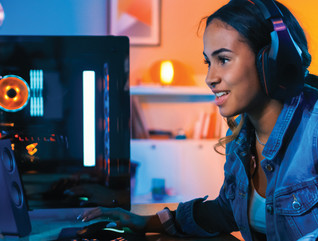 Competitive Esports player at computer