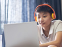 K–12 student watching videos at home in flipped-classroom model