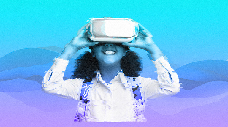 smiling student uses Virtual Reality headset