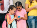 Little girls use personal devices