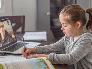 girl studying online from laptop