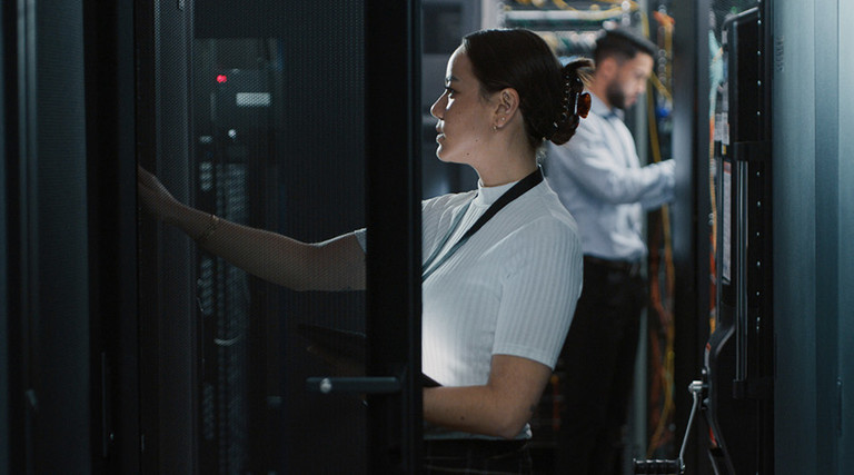 People working in a data center