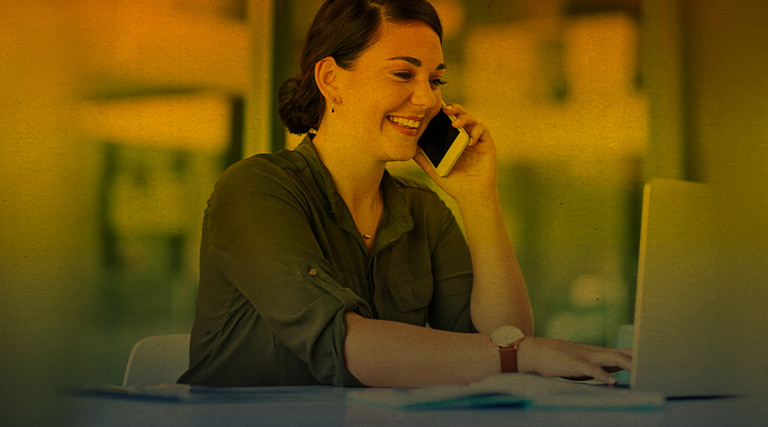 IT leader on phone with vCISO