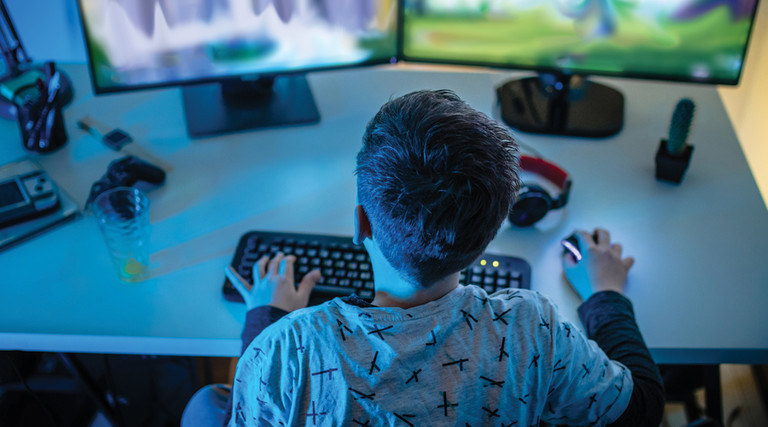 k-12 student playing video games for educational benefit