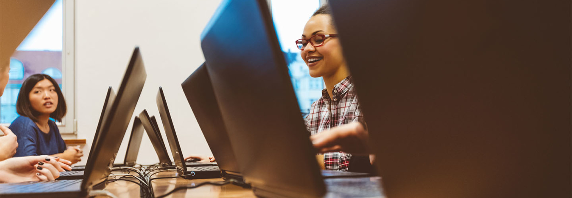students on laptops