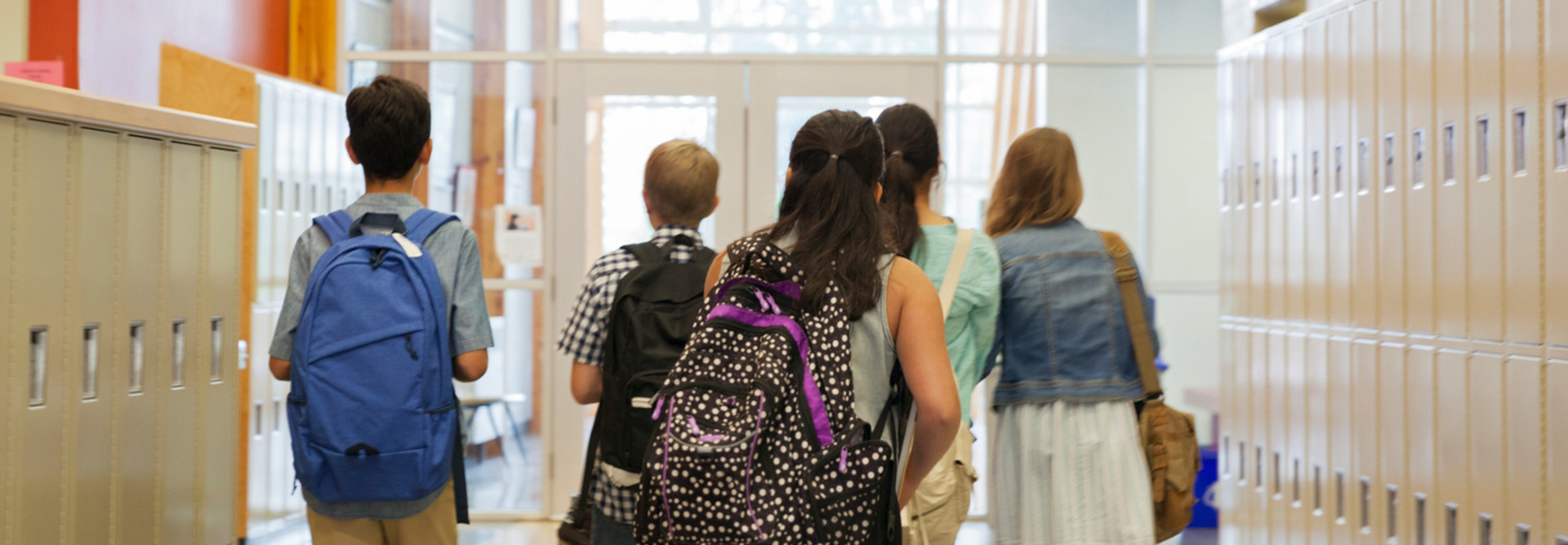 students walking the hall
