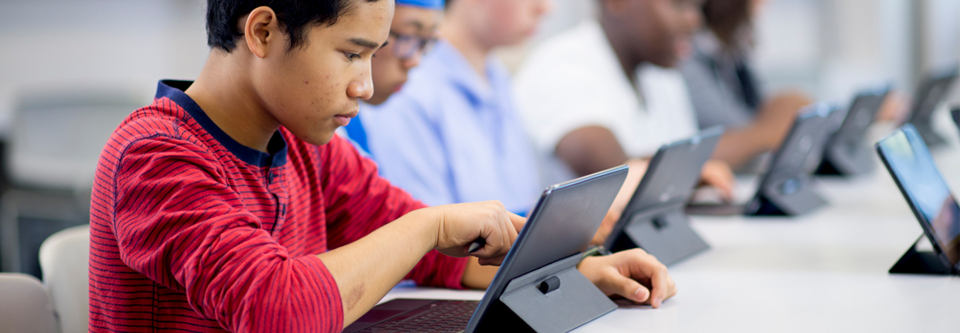 Kid on tablet