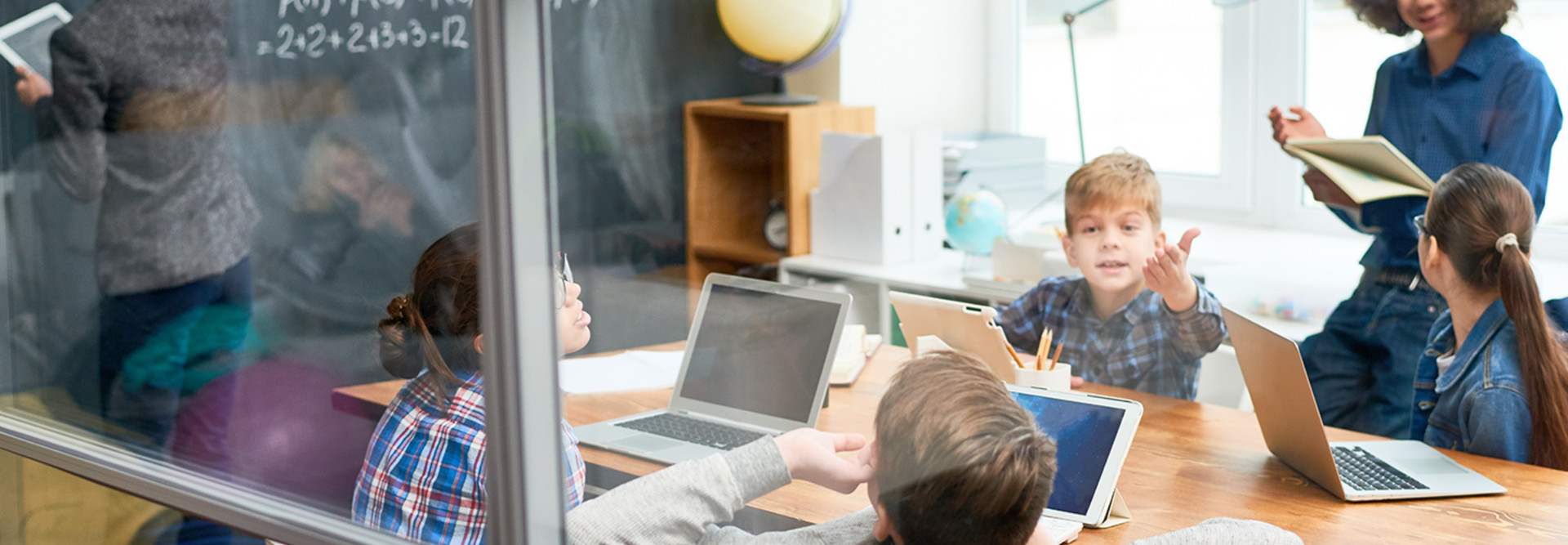 kids in school on tablets