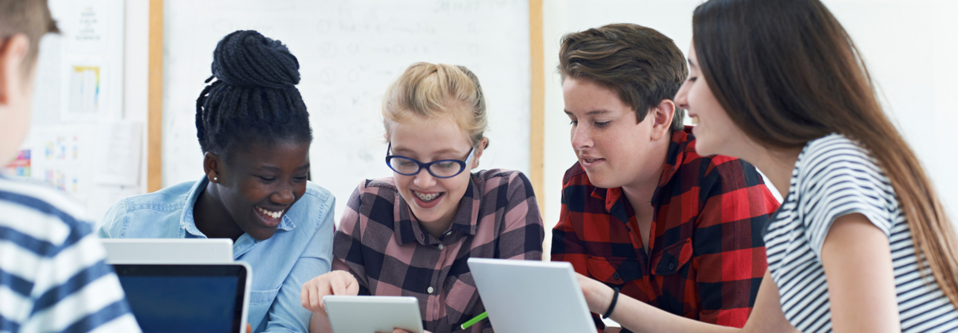 Junior high school kids with devices