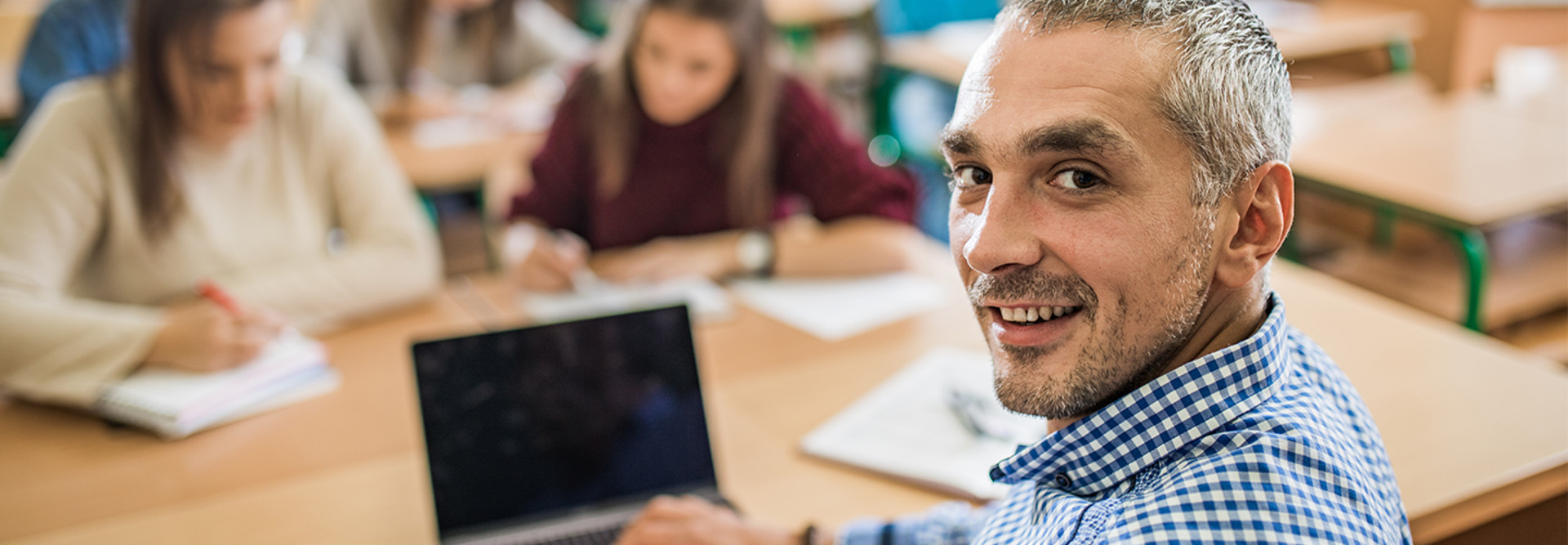teachers with laptop