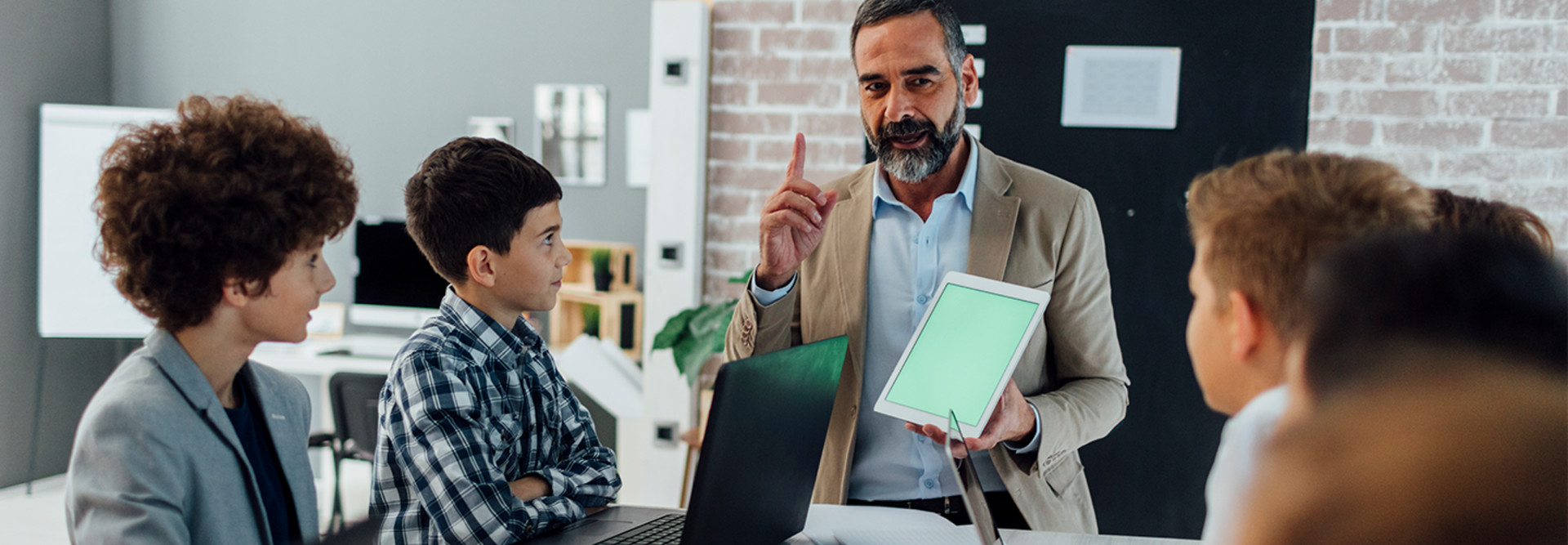 Teacher with tablet