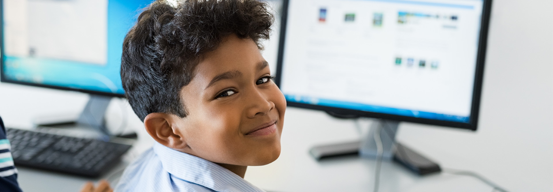 Kid on school computer