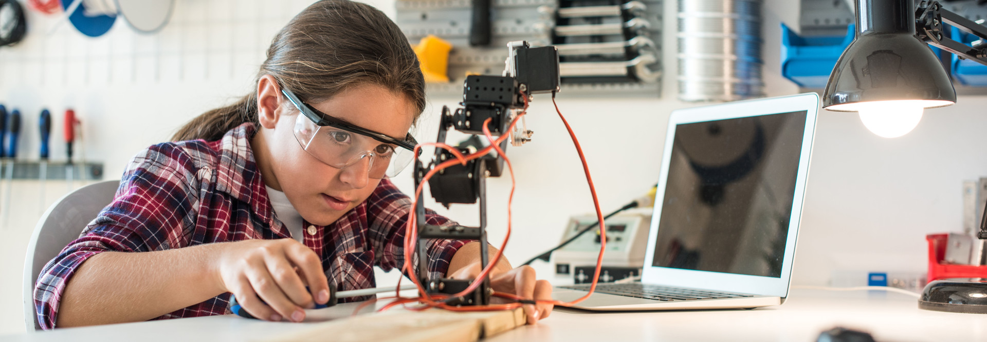 Girl works on engineering project.