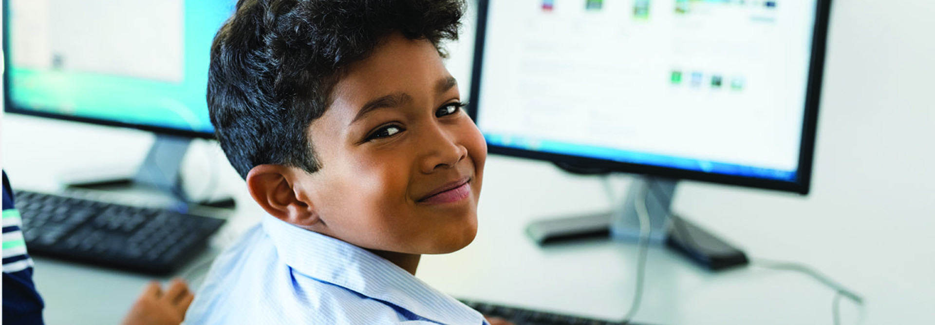 boy using computer