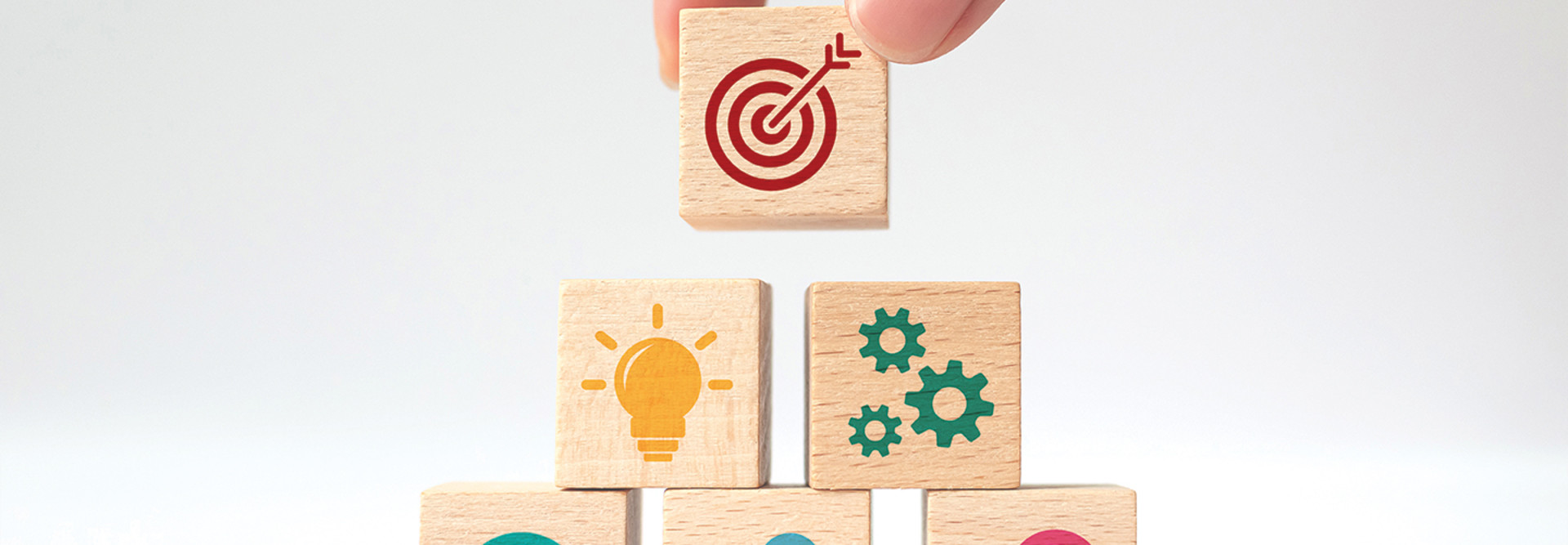 stacked wooden cubes with icons