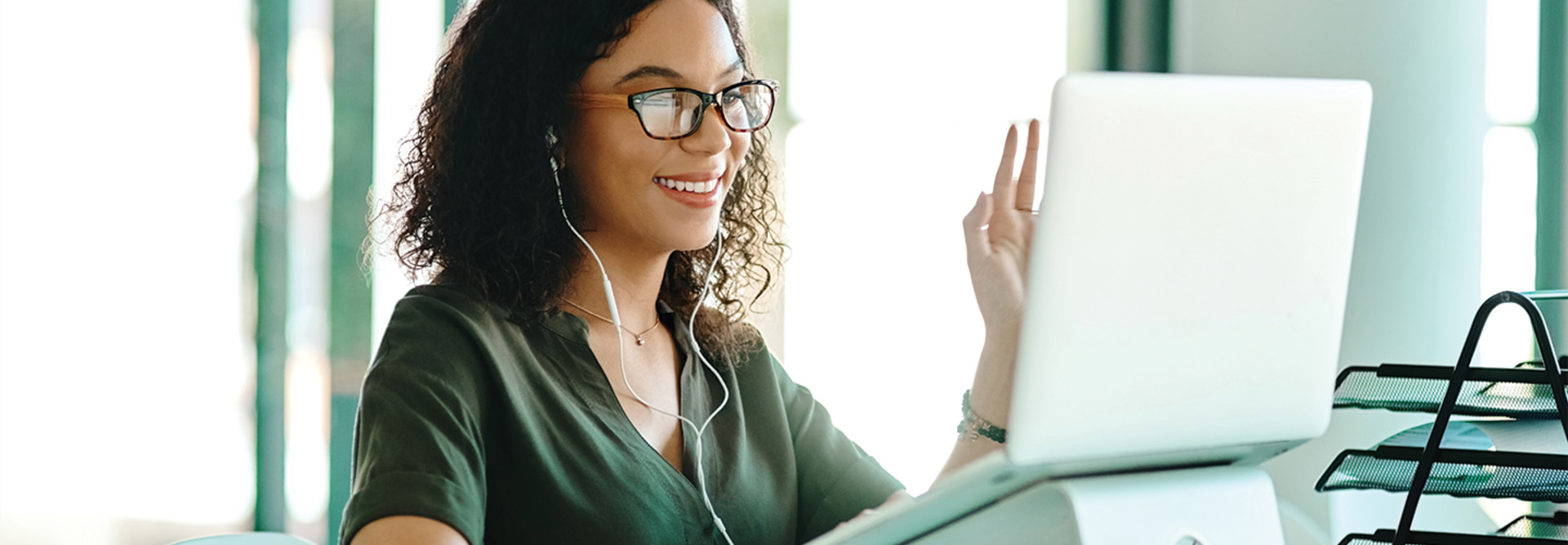 woman videoconferencing via laptop