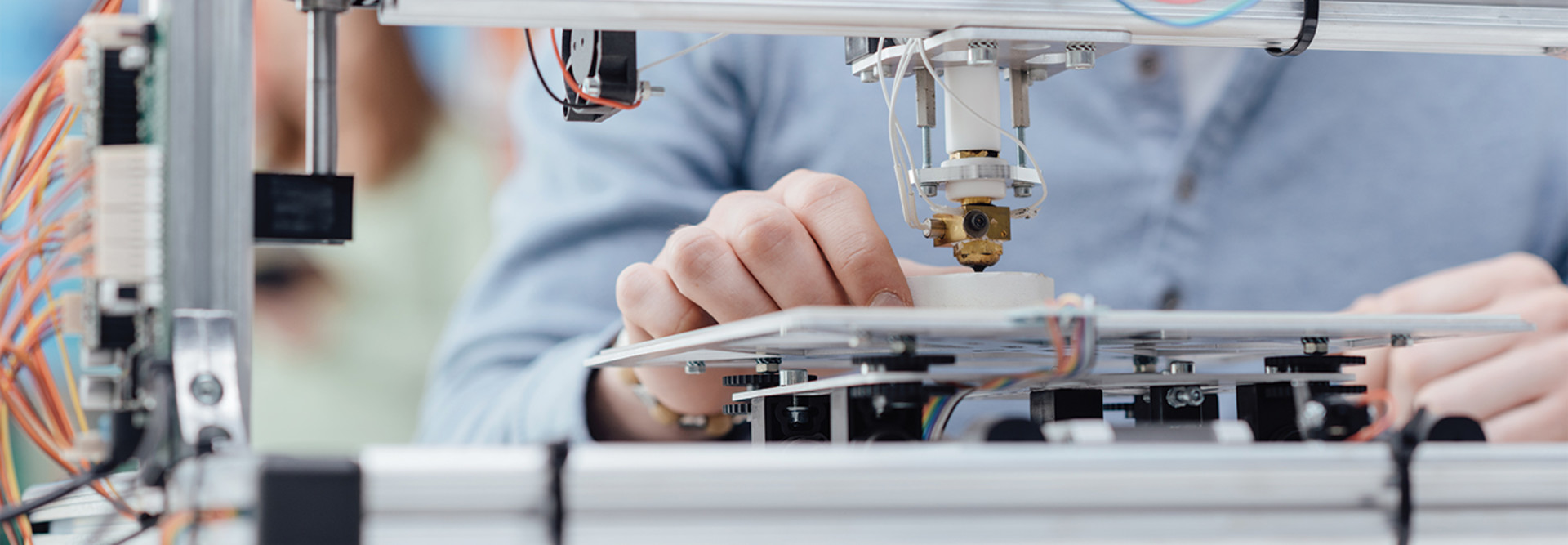 man using 3D printer