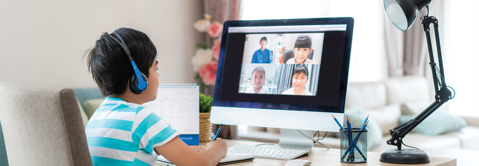 boy using computer at home