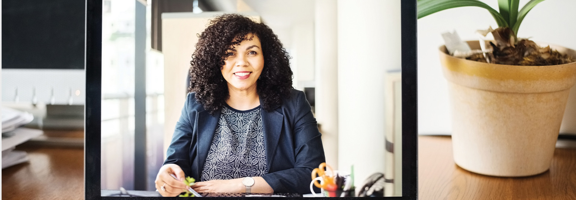 Adult woman having video call on laptop