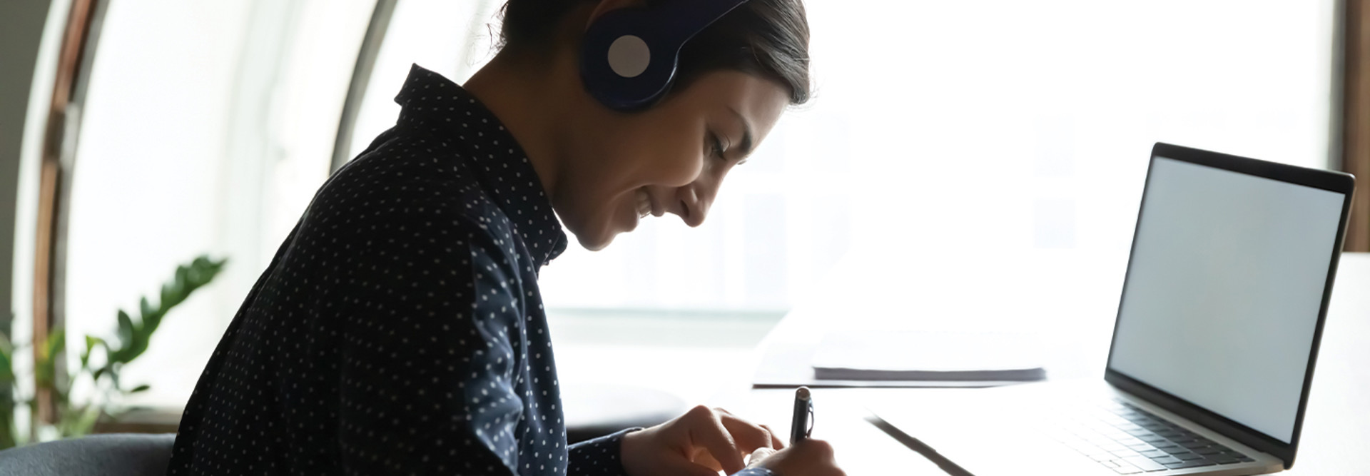 young woman using laptop