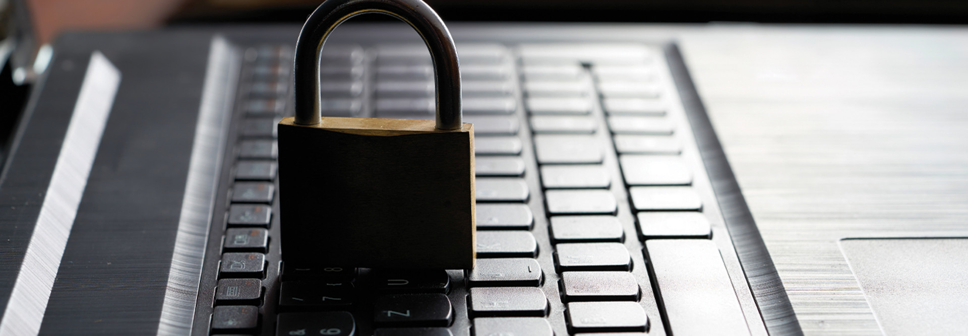 padlock on laptop keyboard