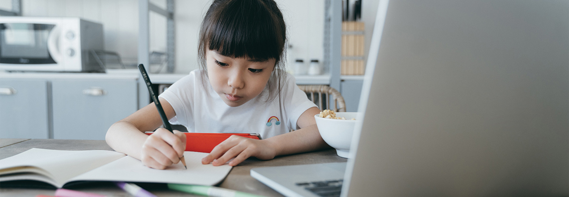 girl studying from home with laptop