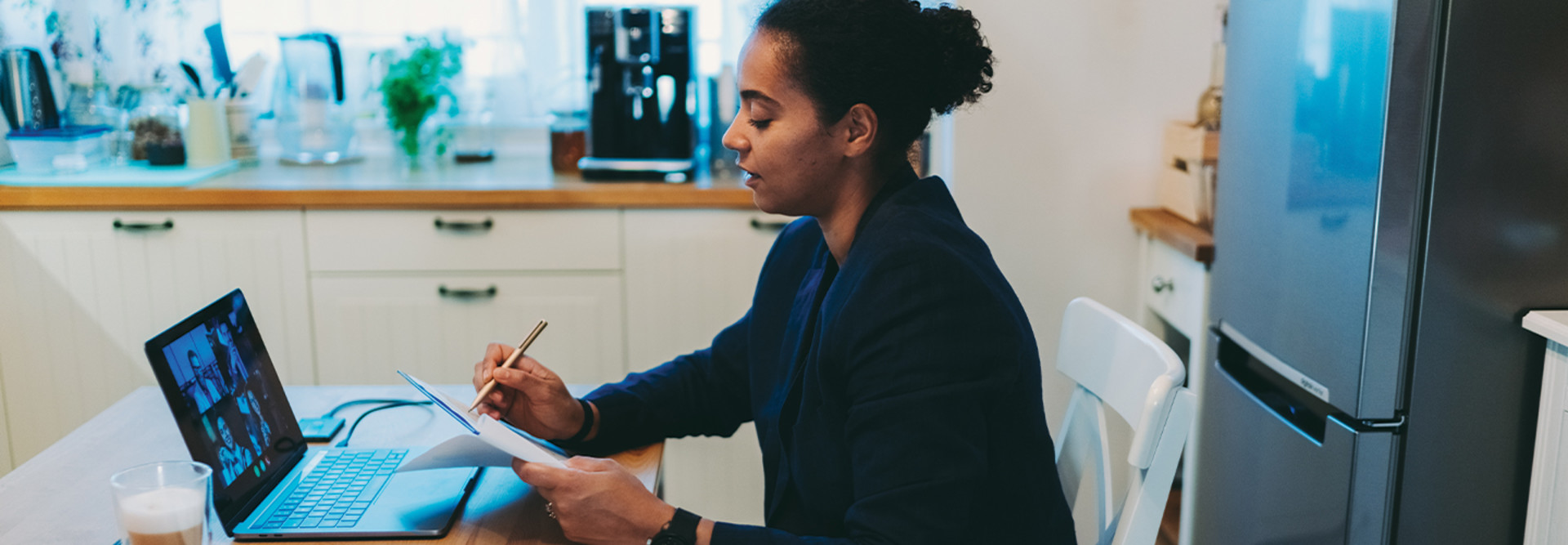 woman with laptop working from home 
