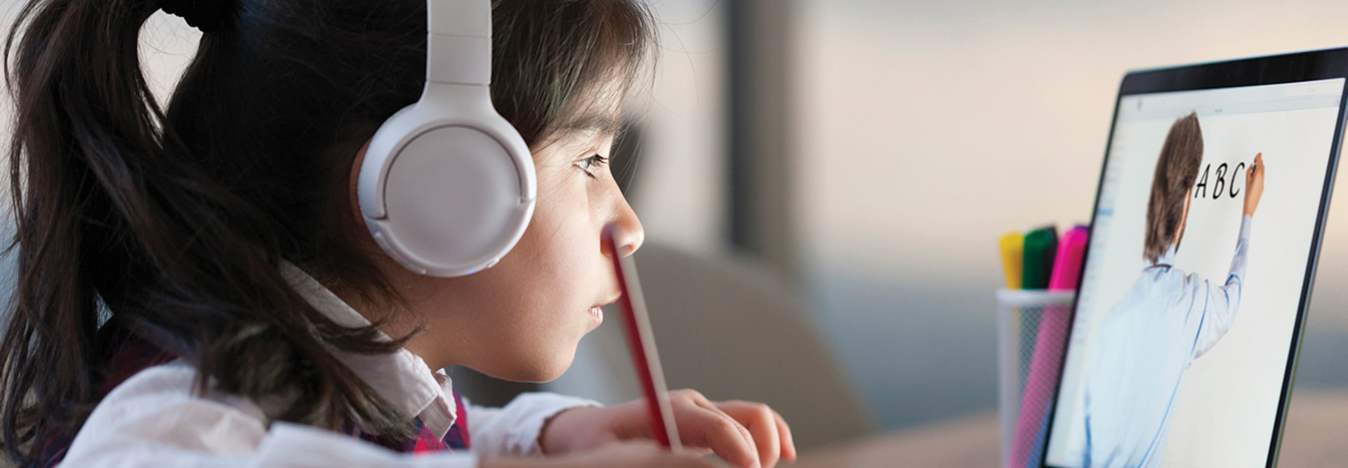 Girl learning in online school