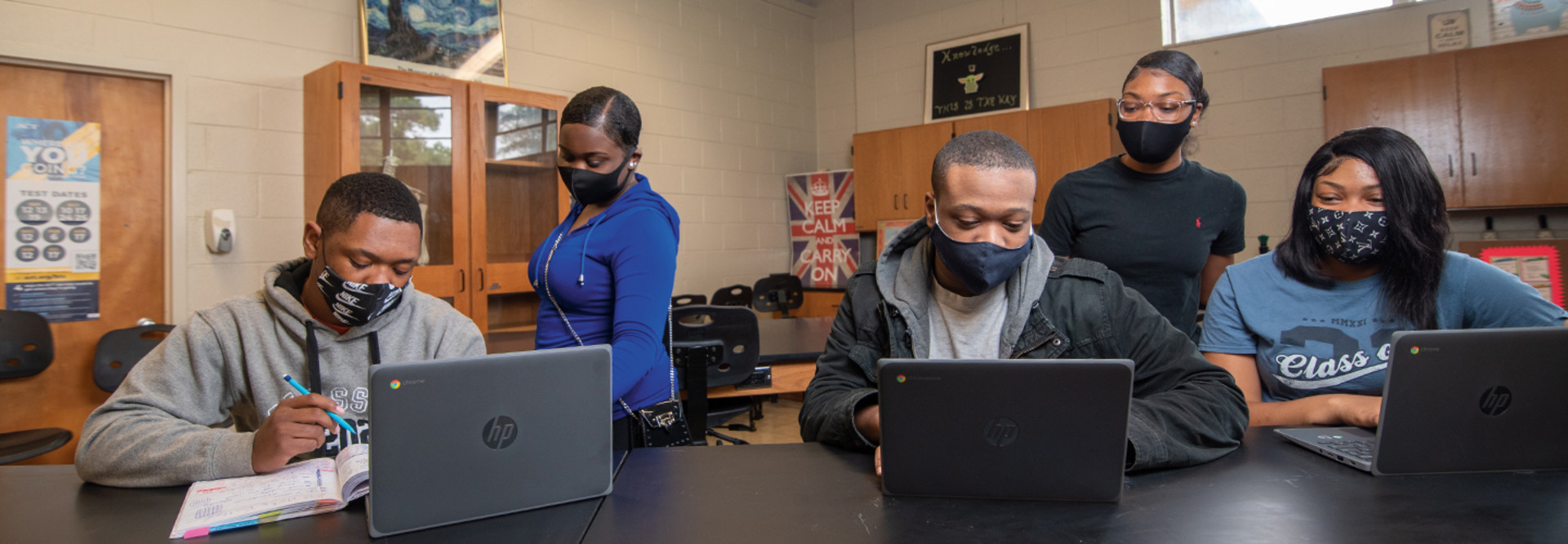 Title I students complete school work on HP laptops