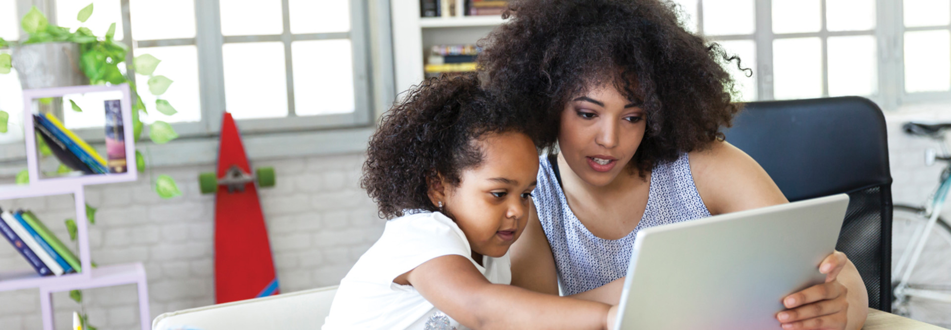 Student and Parent engaged in remote learning