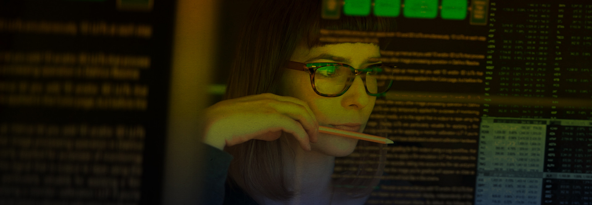 Person conducting threat assessment, looking at data, cybersecurity