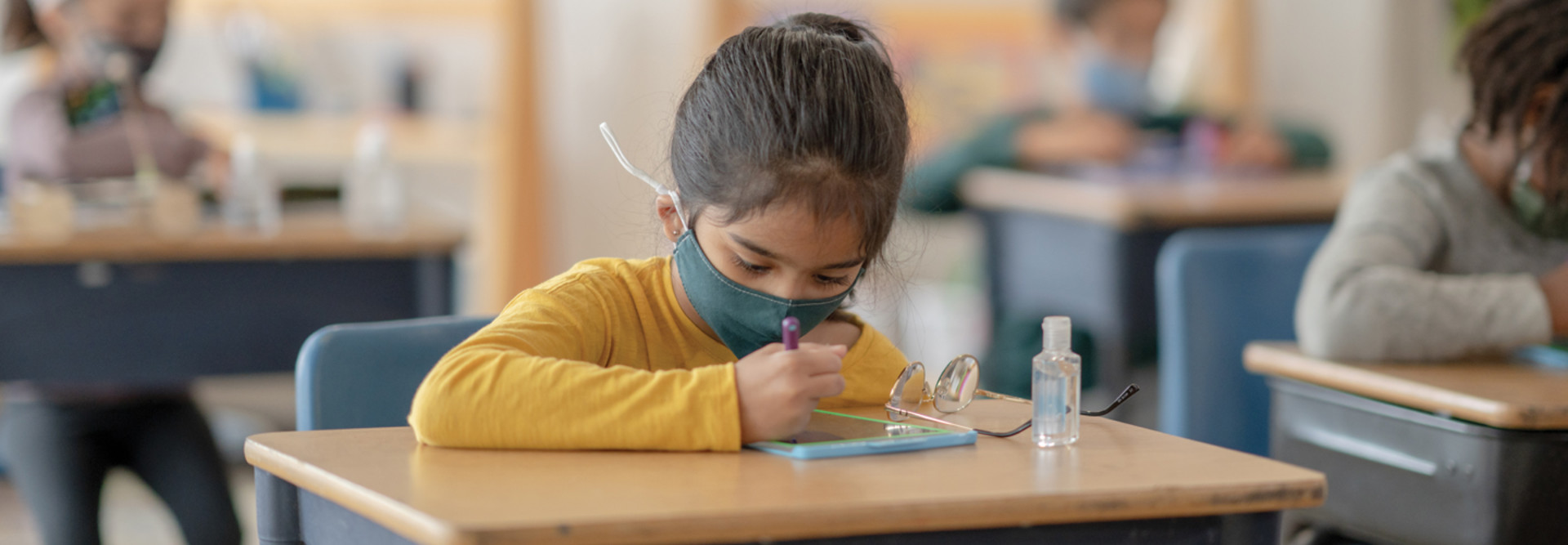 student using tablet in classroom digital equity in K–12