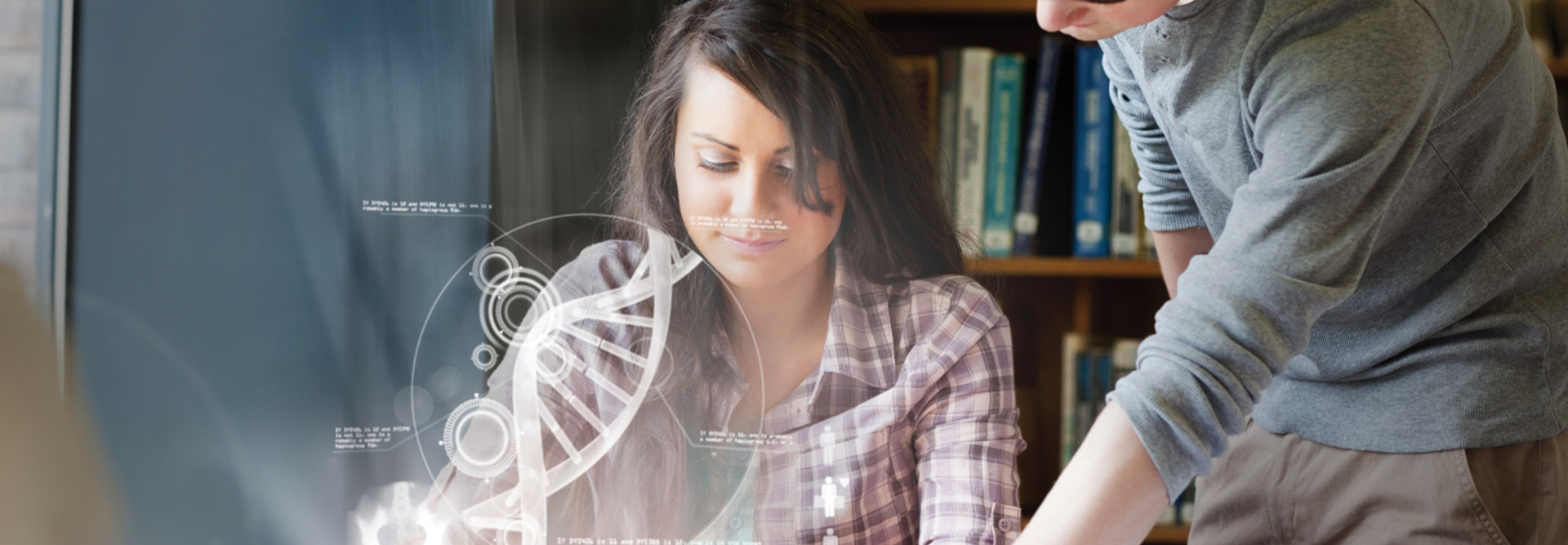 Students looking at hologram of helix dna