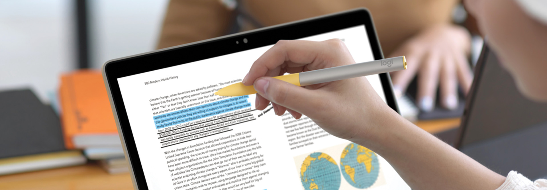K–12 Student using logitech pen with chromebook touchscreen