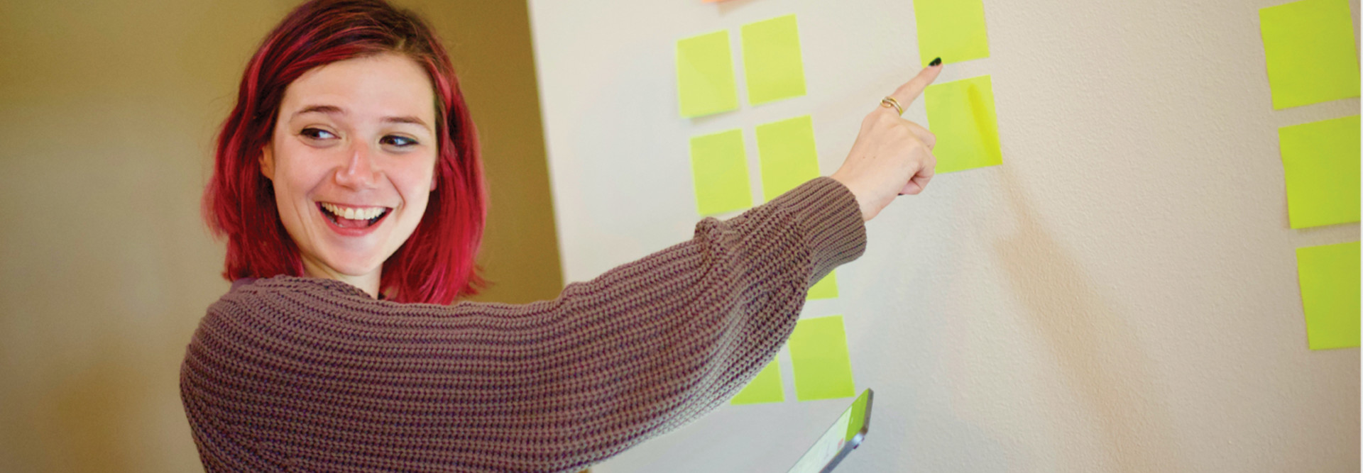 teacher pointing at board
