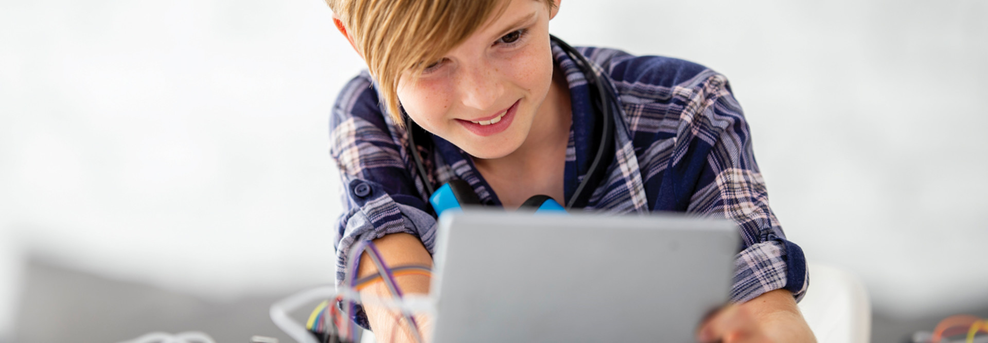 K–12 student learning computer science on a tablet