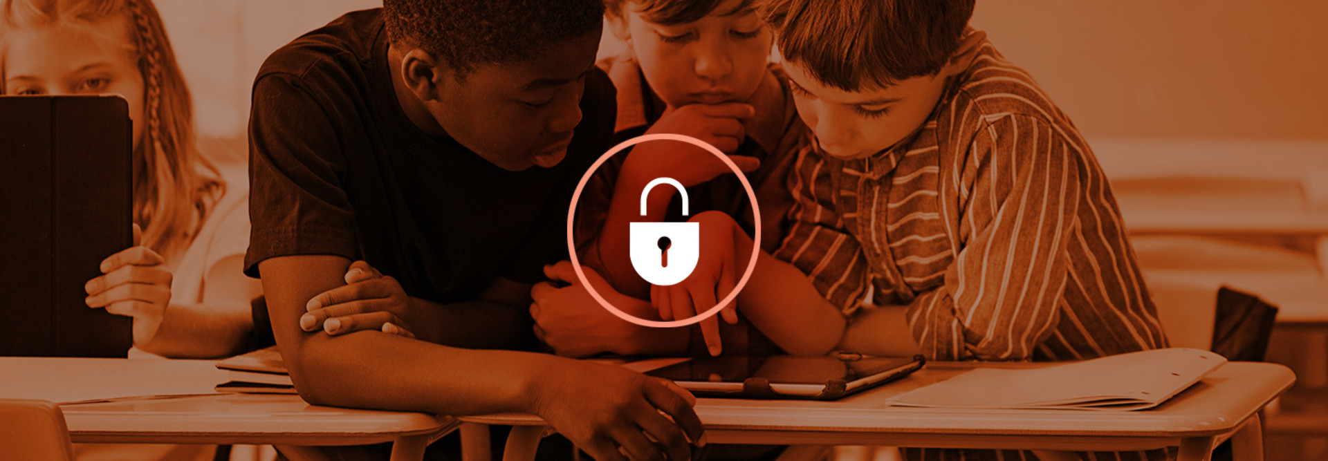 Security icon overlaid over students using tech