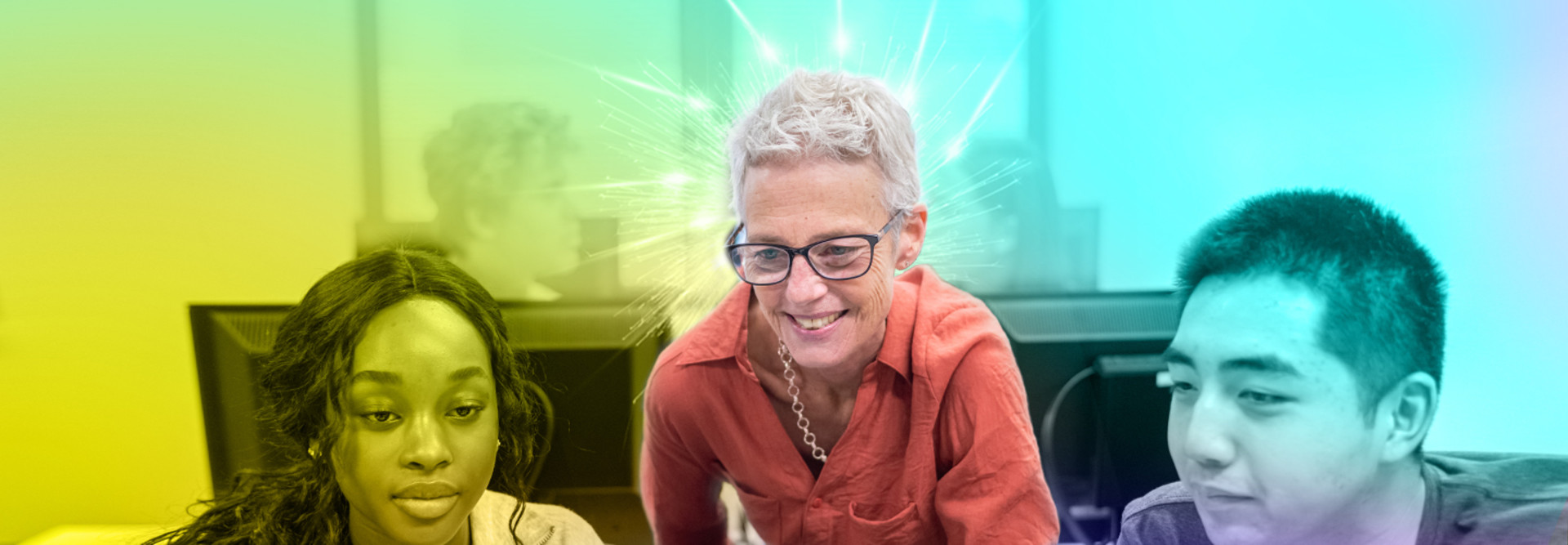 Reignited Educator Helps Students Working on Computers