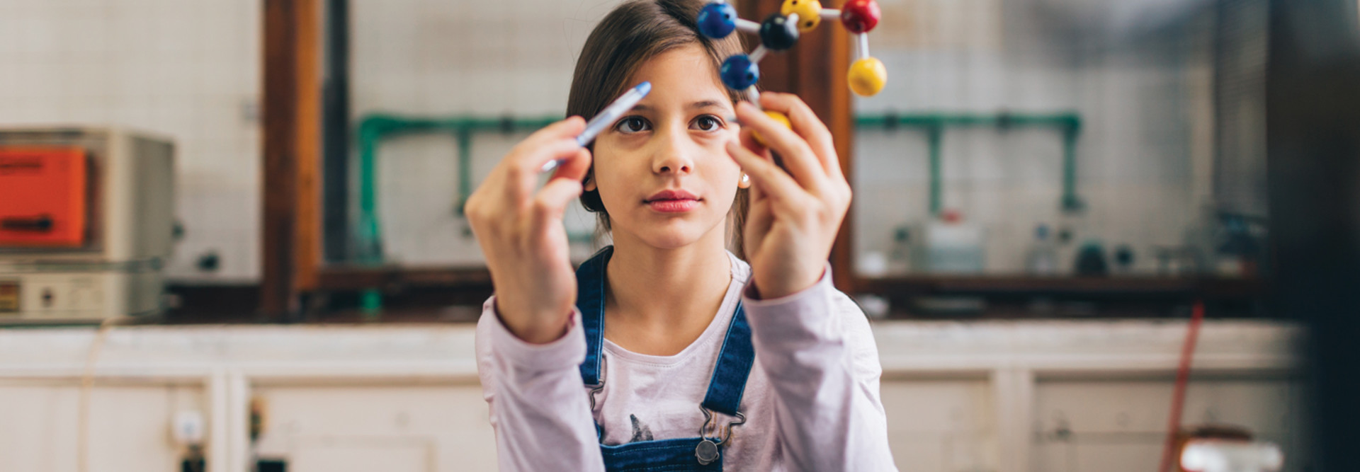 Student using hands-on materials for STEM class
