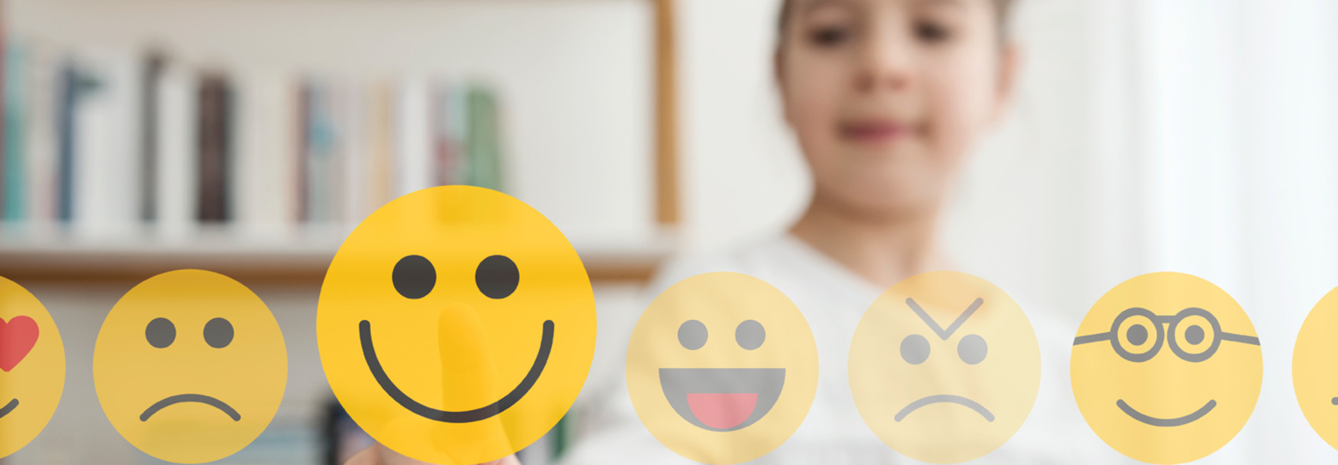 K–12 student chooses smiley face for good mental health in school